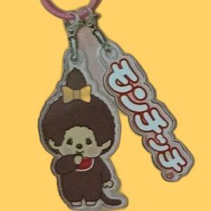 two monchichi charms